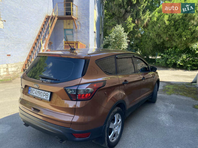 Коричневый Форд Эскейп, объемом двигателя 2.49 л и пробегом 240 тыс. км за 12800 $, фото 2 на Automoto.ua