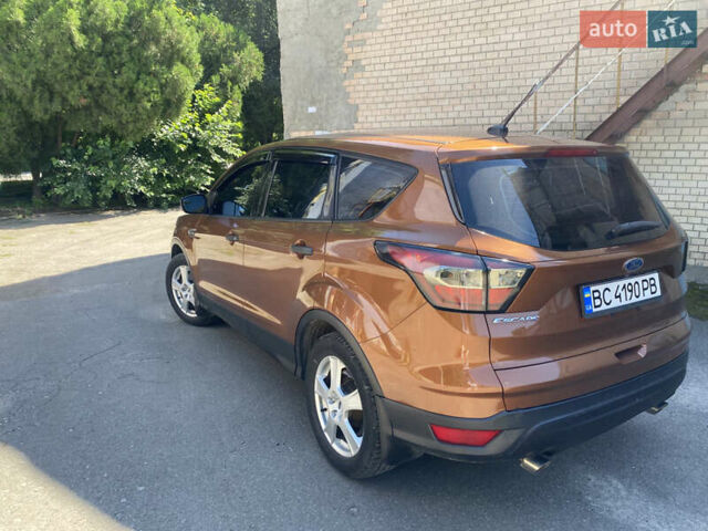 Коричневый Форд Эскейп, объемом двигателя 2.49 л и пробегом 240 тыс. км за 12800 $, фото 3 на Automoto.ua