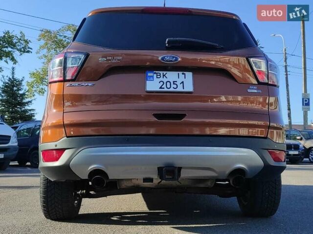 Коричневый Форд Эскейп, объемом двигателя 2 л и пробегом 140 тыс. км за 14000 $, фото 4 на Automoto.ua