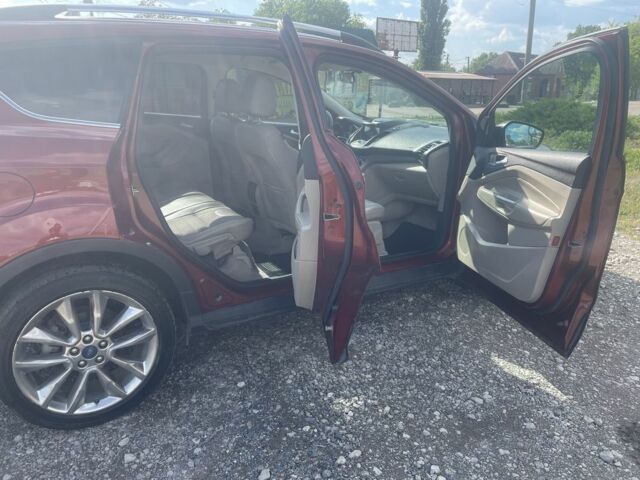 Красный Форд Эскейп, объемом двигателя 1.6 л и пробегом 129 тыс. км за 11000 $, фото 6 на Automoto.ua