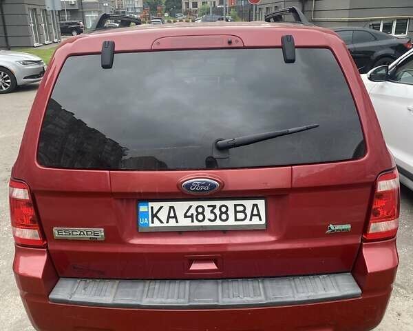 Красный Форд Эскейп, объемом двигателя 2.97 л и пробегом 224 тыс. км за 8900 $, фото 1 на Automoto.ua