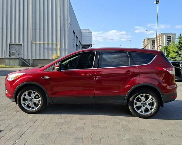 Красный Форд Эскейп, объемом двигателя 2 л и пробегом 228 тыс. км за 10850 $, фото 5 на Automoto.ua