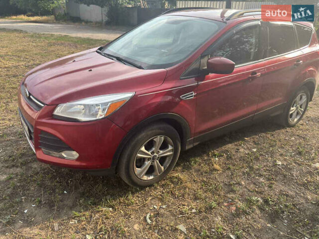 Красный Форд Эскейп, объемом двигателя 2 л и пробегом 186 тыс. км за 11200 $, фото 6 на Automoto.ua