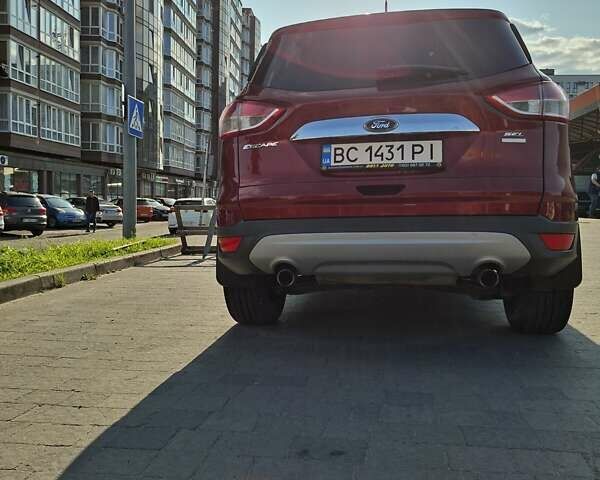 Красный Форд Эскейп, объемом двигателя 2 л и пробегом 228 тыс. км за 10850 $, фото 9 на Automoto.ua