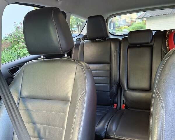 Красный Форд Эскейп, объемом двигателя 2 л и пробегом 228 тыс. км за 10850 $, фото 63 на Automoto.ua