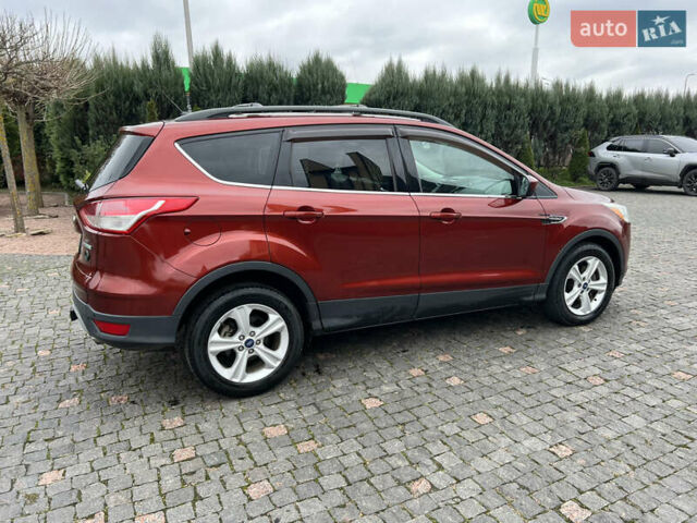 Красный Форд Эскейп, объемом двигателя 2 л и пробегом 206 тыс. км за 9500 $, фото 11 на Automoto.ua