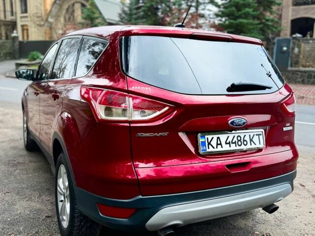 Красный Форд Эскейп, объемом двигателя 2 л и пробегом 160 тыс. км за 11250 $, фото 5 на Automoto.ua