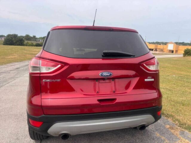 Красный Форд Эскейп, объемом двигателя 1.6 л и пробегом 86 тыс. км за 9200 $, фото 4 на Automoto.ua