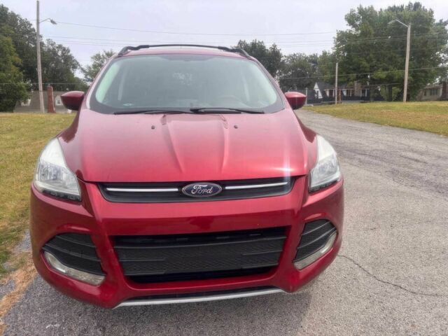 Красный Форд Эскейп, объемом двигателя 1.6 л и пробегом 86 тыс. км за 9200 $, фото 1 на Automoto.ua