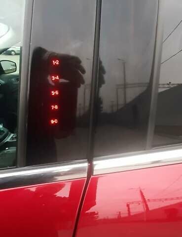 Красный Форд Эскейп, объемом двигателя 2 л и пробегом 93 тыс. км за 11300 $, фото 7 на Automoto.ua