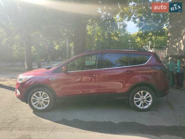 Красный Форд Эскейп, объемом двигателя 2 л и пробегом 118 тыс. км за 13000 $, фото 5 на Automoto.ua