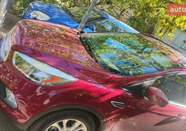 Красный Форд Эскейп, объемом двигателя 2 л и пробегом 118 тыс. км за 13000 $, фото 4 на Automoto.ua