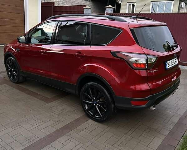 Красный Форд Эскейп, объемом двигателя 2 л и пробегом 170 тыс. км за 13500 $, фото 2 на Automoto.ua