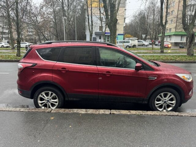 Красный Форд Эскейп, объемом двигателя 2 л и пробегом 180 тыс. км за 14000 $, фото 2 на Automoto.ua
