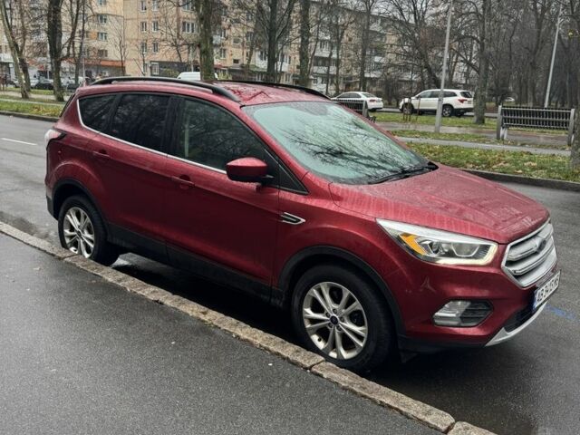 Красный Форд Эскейп, объемом двигателя 2 л и пробегом 180 тыс. км за 14000 $, фото 1 на Automoto.ua