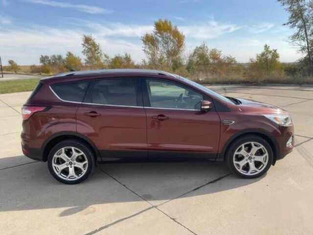 Красный Форд Эскейп, объемом двигателя 2 л и пробегом 47 тыс. км за 10000 $, фото 5 на Automoto.ua