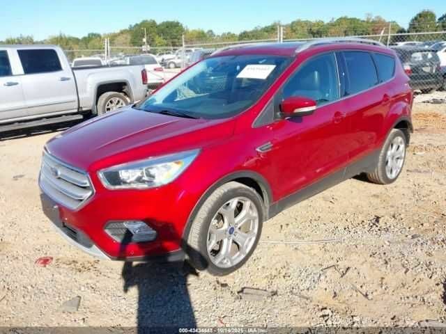 Красный Форд Эскейп, объемом двигателя 2 л и пробегом 52 тыс. км за 3000 $, фото 1 на Automoto.ua