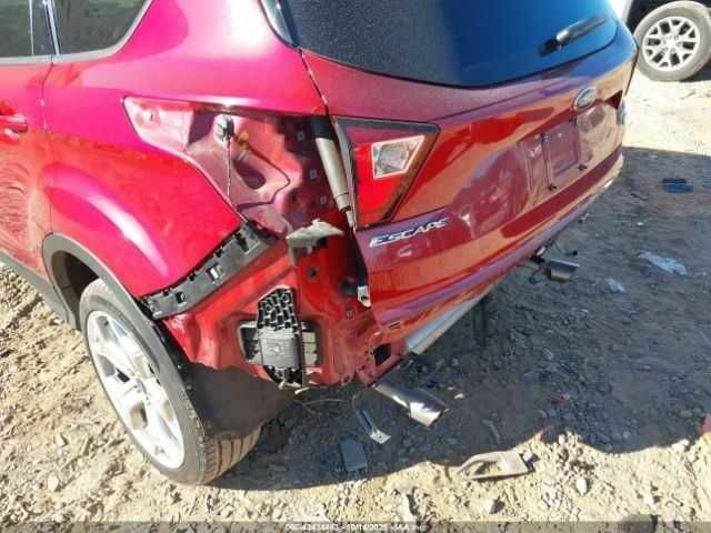 Красный Форд Эскейп, объемом двигателя 2 л и пробегом 52 тыс. км за 3000 $, фото 5 на Automoto.ua