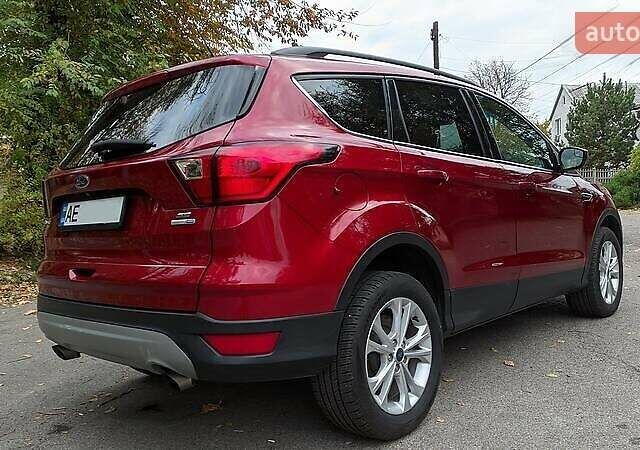Красный Форд Эскейп, объемом двигателя 2 л и пробегом 140 тыс. км за 14800 $, фото 3 на Automoto.ua