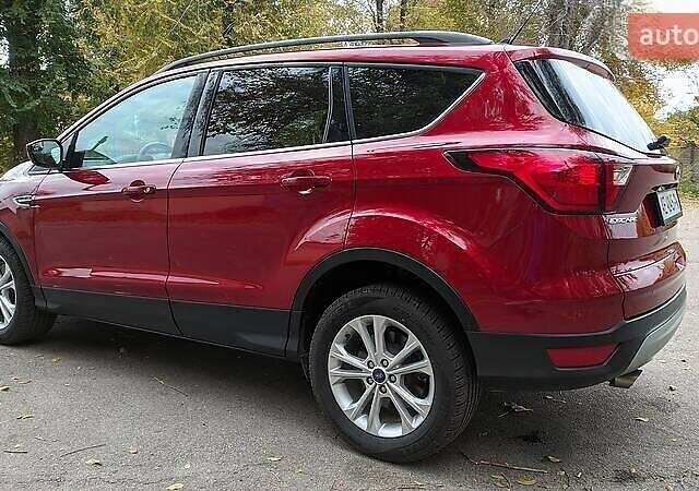 Красный Форд Эскейп, объемом двигателя 2 л и пробегом 140 тыс. км за 14800 $, фото 5 на Automoto.ua