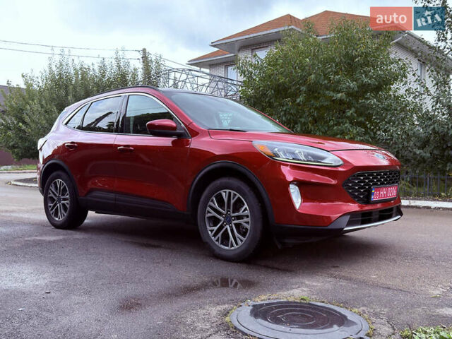 Красный Форд Эскейп, объемом двигателя 2 л и пробегом 153 тыс. км за 18700 $, фото 1 на Automoto.ua