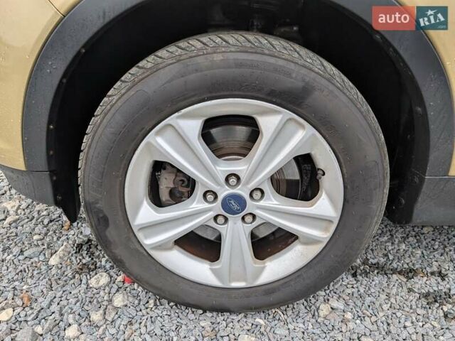 Желтый Форд Эскейп, объемом двигателя 1.6 л и пробегом 191 тыс. км за 8550 $, фото 20 на Automoto.ua