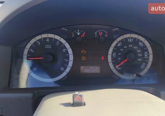 Серый Форд Эскейп, объемом двигателя 2.5 л и пробегом 338 тыс. км за 8500 $, фото 3 на Automoto.ua