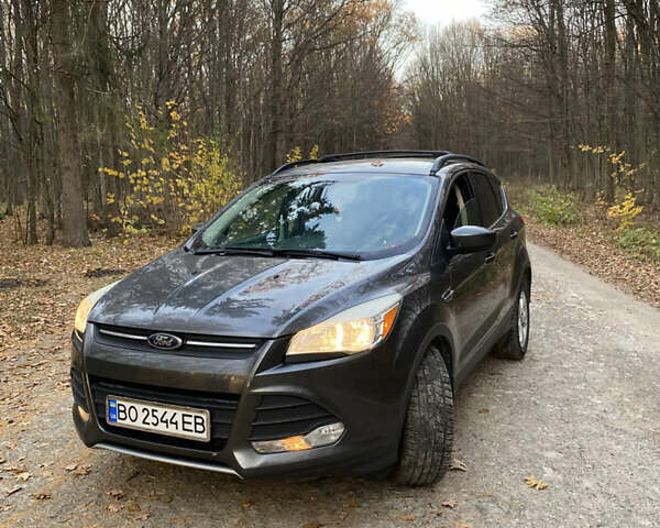 Серый Форд Эскейп, объемом двигателя 2 л и пробегом 309 тыс. км за 11000 $, фото 1 на Automoto.ua