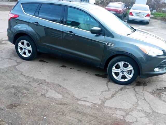 Серый Форд Эскейп, объемом двигателя 2 л и пробегом 208 тыс. км за 11800 $, фото 1 на Automoto.ua