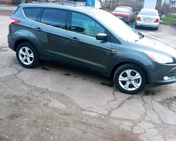 Сірий Форд Ескейп, об'ємом двигуна 2 л та пробігом 208 тис. км за 11800 $, фото 6 на Automoto.ua