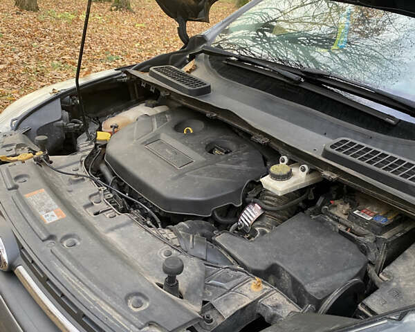 Серый Форд Эскейп, объемом двигателя 2 л и пробегом 309 тыс. км за 11000 $, фото 13 на Automoto.ua