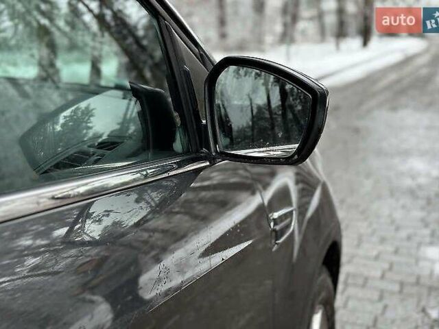 Серый Форд Эскейп, объемом двигателя 2 л и пробегом 129 тыс. км за 10900 $, фото 3 на Automoto.ua