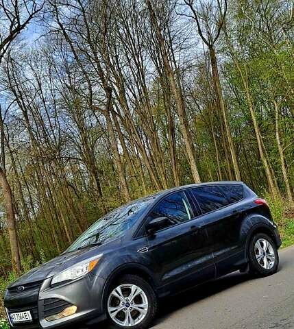 Серый Форд Эскейп, объемом двигателя 2.5 л и пробегом 165 тыс. км за 11000 $, фото 1 на Automoto.ua