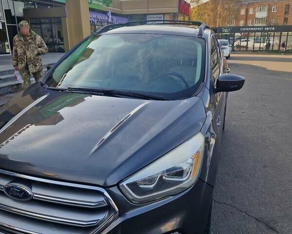 Серый Форд Эскейп, объемом двигателя 1.5 л и пробегом 125 тыс. км за 13500 $, фото 1 на Automoto.ua