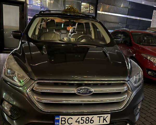 Серый Форд Эскейп, объемом двигателя 2 л и пробегом 165 тыс. км за 13400 $, фото 1 на Automoto.ua