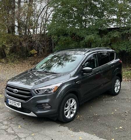 Сірий Форд Ескейп, об'ємом двигуна 2 л та пробігом 220 тис. км за 12700 $, фото 1 на Automoto.ua