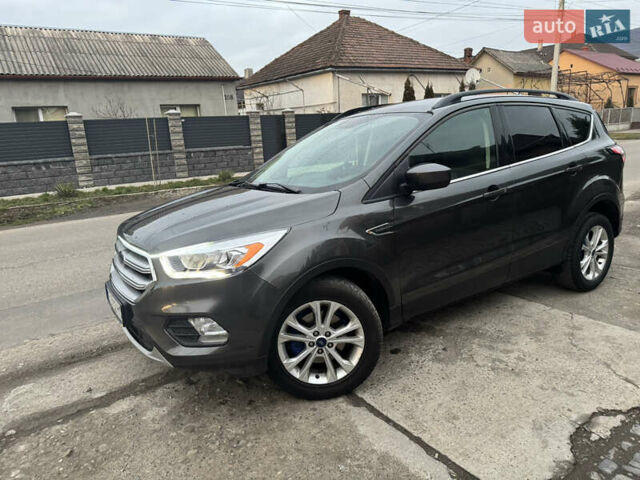 Серый Форд Эскейп, объемом двигателя 1.5 л и пробегом 265 тыс. км за 12500 $, фото 4 на Automoto.ua
