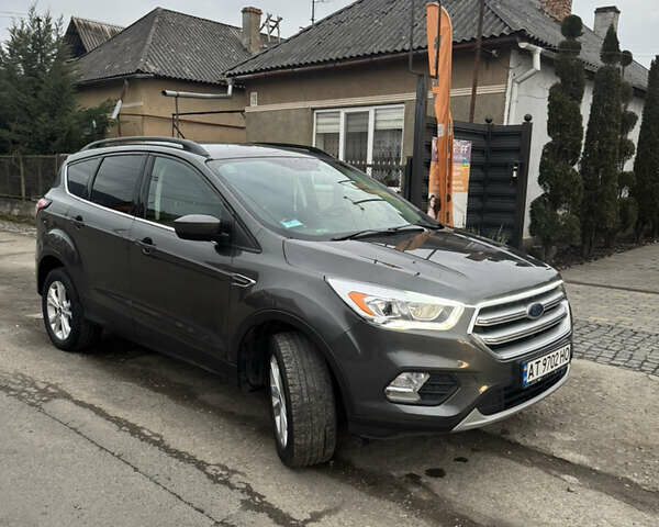 Серый Форд Эскейп, объемом двигателя 1.5 л и пробегом 265 тыс. км за 12500 $, фото 2 на Automoto.ua