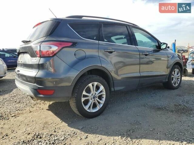 Серый Форд Эскейп, объемом двигателя 2 л и пробегом 115 тыс. км за 1700 $, фото 2 на Automoto.ua