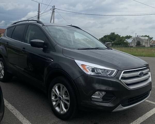 Серый Форд Эскейп, объемом двигателя 1.5 л и пробегом 203 тыс. км за 13500 $, фото 1 на Automoto.ua