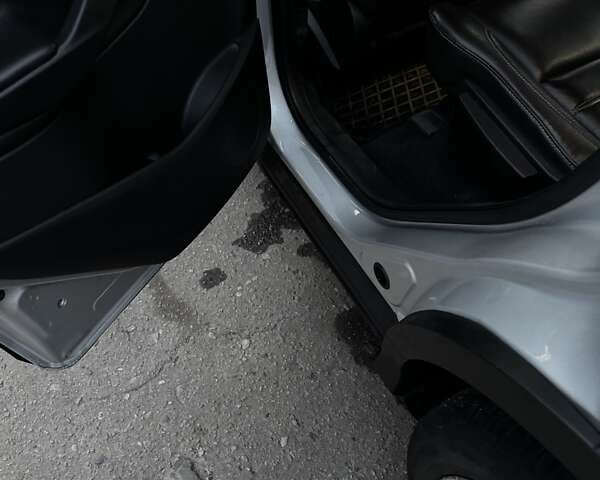 Серый Форд Эскейп, объемом двигателя 2 л и пробегом 81 тыс. км за 17300 $, фото 13 на Automoto.ua