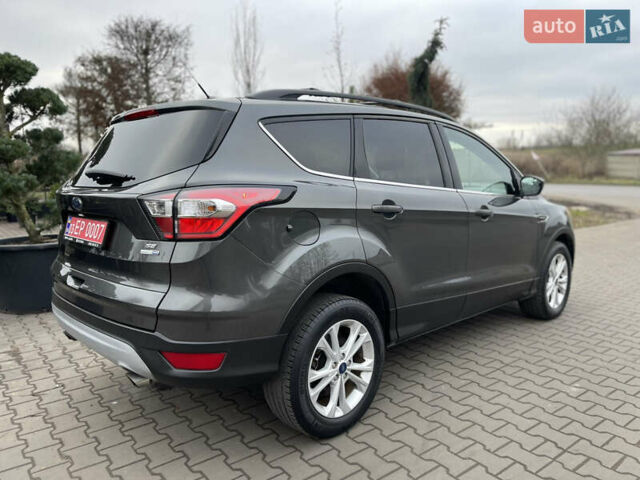 Сірий Форд Ескейп, об'ємом двигуна 1.5 л та пробігом 82 тис. км за 11999 $, фото 9 на Automoto.ua