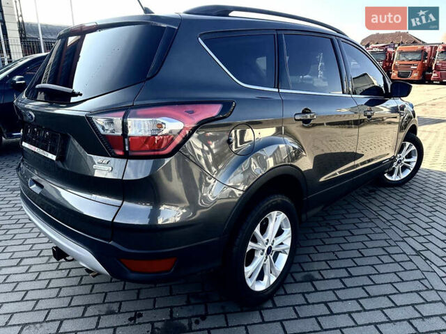 Серый Форд Эскейп, объемом двигателя 1.5 л и пробегом 143 тыс. км за 10999 $, фото 7 на Automoto.ua