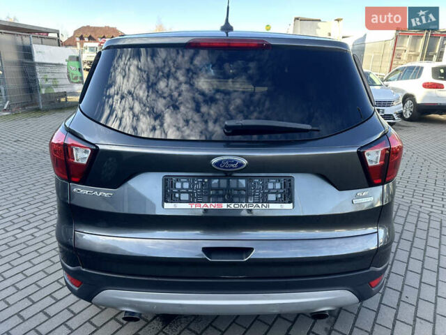 Сірий Форд Ескейп, об'ємом двигуна 1.5 л та пробігом 230 тис. км за 9699 $, фото 3 на Automoto.ua