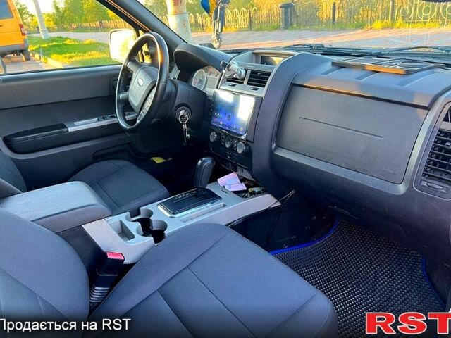 Синий Форд Эскейп, объемом двигателя 2.5 л и пробегом 236 тыс. км за 7300 $, фото 1 на Automoto.ua