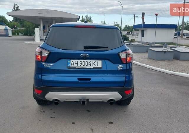 Синий Форд Эскейп, объемом двигателя 2 л и пробегом 57 тыс. км за 15000 $, фото 3 на Automoto.ua