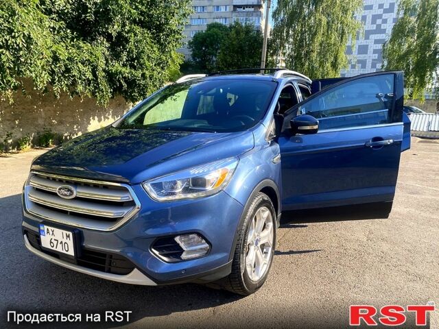 Синий Форд Эскейп, объемом двигателя 2 л и пробегом 65 тыс. км за 14000 $, фото 4 на Automoto.ua