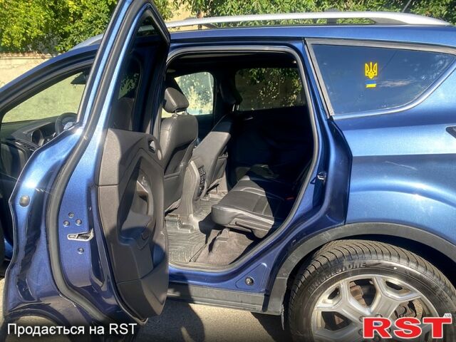 Синий Форд Эскейп, объемом двигателя 2 л и пробегом 65 тыс. км за 14000 $, фото 3 на Automoto.ua