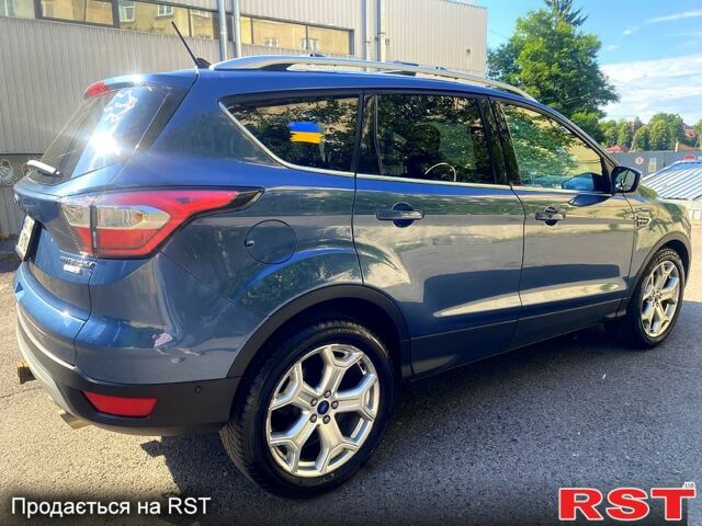 Синий Форд Эскейп, объемом двигателя 2 л и пробегом 65 тыс. км за 14000 $, фото 8 на Automoto.ua