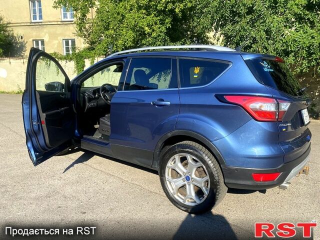 Синий Форд Эскейп, объемом двигателя 2 л и пробегом 65 тыс. км за 14000 $, фото 2 на Automoto.ua